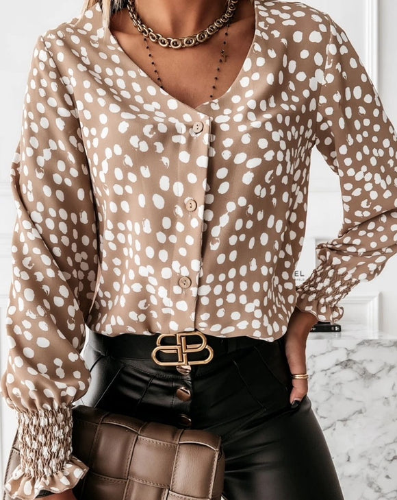 Brown with white dots, button up long sleeve blouse.