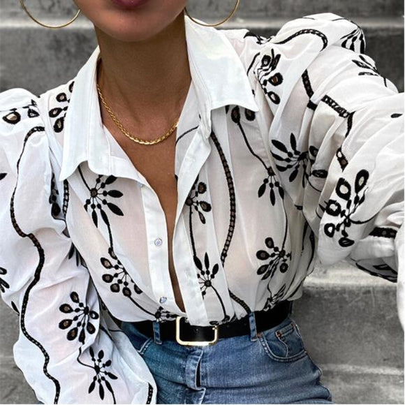 White floral long sleeve collar blouse.