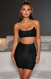 Black sexy crop top and mini skirt.